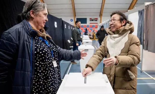 The polling station in Nuuk closes and the Greenlandic votes are counted in Nuuk, Greenland, Tuesday, March 24, 2026. Greenland is represented in the Danish Parliament with two mandates, which are elected every four years in a single electoral district. (Oscar Scott Carl/Ritzau Scanpix via AP)