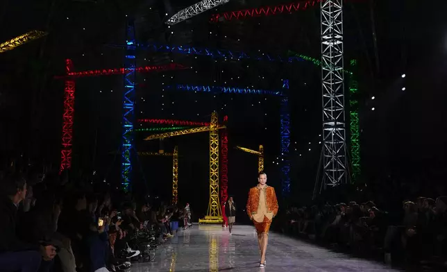 A model wears a creation as part of the Chanel Fall/Winter 2026-2027 Women's collection presented in Paris, Monday, March 9, 2026. (AP Photo/Aurelien Morissard)