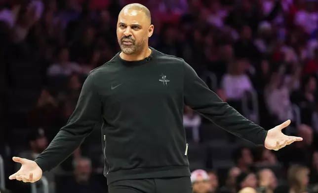 Houston Rockets head coach Ime Udoka reacts during the first half of an NBA basketball game against the Miami Heat, Saturday, Feb. 28, 2026, in Miami. (AP Photo/Lynne Sladky)