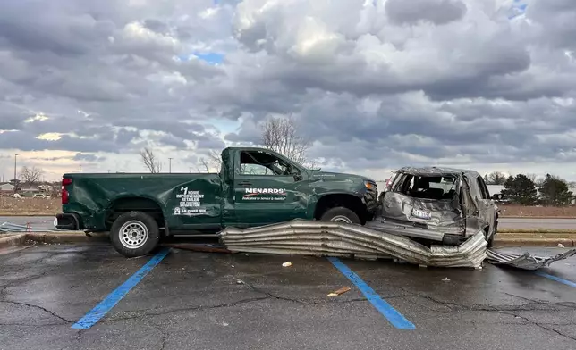 Damage is seen outside Menard's store after a severe storm in Three Rivers, Mich., Friday, March 6, 2026. (Devin Anderson-Torrez/MLive via AP)