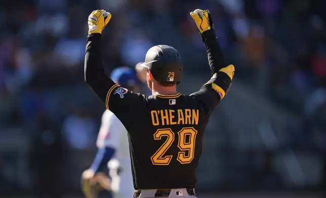 Pittsburgh Pirates' Ryan O'Hearn (29) reacts after hitting an RBI single during the 10th inning of a baseball game against the New York Mets, Sunday, March 29, 2026, in New York. (AP Photo/Seth Wenig)