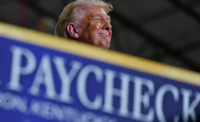 President Donald Trump speaks at Verst Logistics Wednesday, March 11, 2026, in Hebron, Ky. (AP Photo/Julia Demaree Nikhinson)