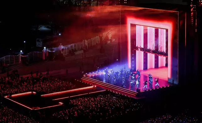 Kpop group BTS perform during 'BTS The Comeback Live Arirang' concert in central Seoul, South Korea, March 21, 2026. (Kim Hong-Ji/Pool Photo via AP)