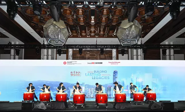 The Diocesan Boys' School Chinese Drum Team and robotic drummers perform a joint ensemble at the opening of the Wealth for Good in Hong Kong Summit today (March 24), showcasing the integration and coexistence of traditional arts and cutting-edge technology. Source: HKSAR Government Press Releases