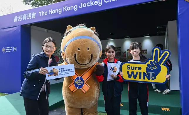 Anita Fung, Steward of The Hong Kong Jockey Club (1st left) visits the Jockey Club booth.