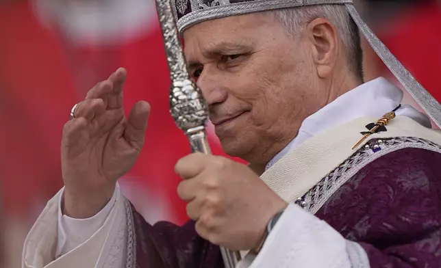 Pope Leo XIV arrives at Stade Louis II in Fontvieille, Monaco, Saturday, March 28, 2026. (AP Photo/Laurent Cipriani)