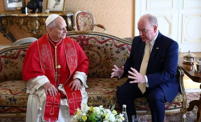 Pope Leo XIV and Prince Albert II of Monaco meet at the Prince's Palace during Leo XIV's one-day pastoral visit to the Principality of Monaco, Saturday, March 28, 2026. (Guglielmo Mangiapane/Pool Photo via AP)