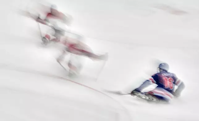 United States' Declan Farmer runs to the puck during a semifinal hockey match between United States and Czech Republic at the 2026 Winter Paralympics, in Milan, Italy, Friday, March 13, 2026. (AP Photo/Luca Bruno)