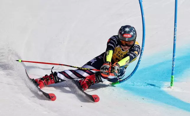United States' Mikaela Shiffrin speeds down the course during a women's World Cup giant slalom, in Are, Sweden, Saturday, March 14, 2026. (AP Photo/Marco Trovati)