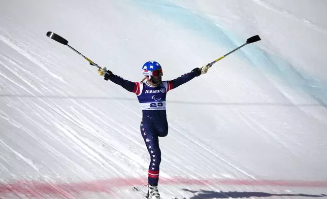 Patrick Halgren, of the United States, reacts after competing in the alpine skiing men's downhill standing competition at the 2026 Winter Paralympics, in Cortina d'Ampezzo, Italy, Saturday, March 7, 2026. (AP Photo/Emilio Morenatti)
