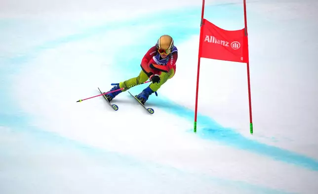 Andrea Rothfuss, of Germany, competes in her second run of the alpine skiing women's giant slalom standing at the 2026 Winter Paralympics, in Cortina d'Ampezzo, Italy, Thursday, March 12, 2026. (AP Photo/Emilio Morenatti)