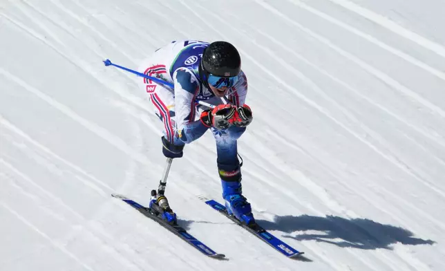 Bernt Marius Roerstad, of Norway, competes in the alpine skiing men's downhill standing competition at the 2026 Winter Paralympics, in Cortina d'Ampezzo, Italy, Saturday, March 7, 2026. (AP Photo/Emilio Morenatti)