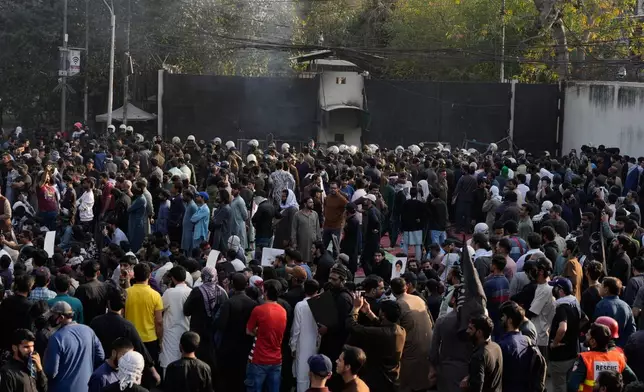Shiite Muslims take part in an anti U.S. rally to condemn the killing of Iranian Supreme Leader Ayatollah Ali Khamenei, in Lahore, Pakistan, Sunday, March 1, 2026. (AP Photo/K.M. Chaudary)