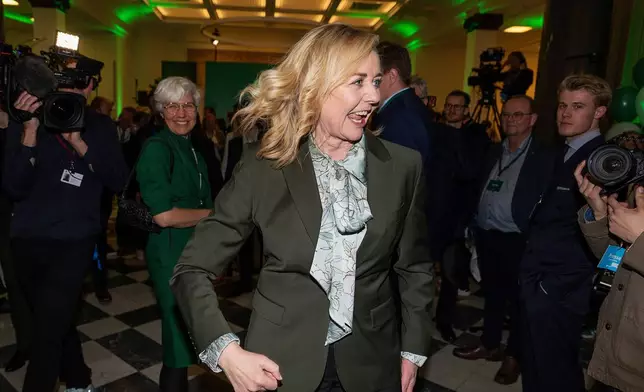 Leader of the Conservative People's Party, Mona Juul, arrives at an election party after the parliamentary election at Tietgen's House, in Copenhagen, Tuesday, March 24, 2026. (Claus Bech/Ritzau Scanpix via AP)