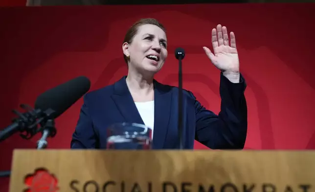 Danish Prime Minister Mette Frederiksen speaks to members of her Social Democratic Party in the Danish Parliament in Copenhagen, Denmark, after the General Election on Tuesday, March 24, 2026. (AP Photo/Sergei Grits)