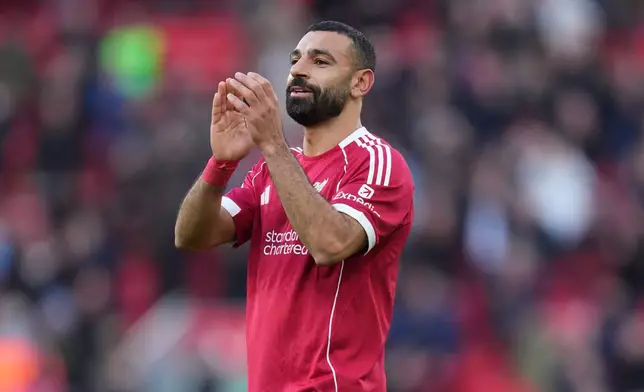 Liverpool's Mohamed Salah walks off the pitch after the Premier League soccer match between Liverpool and West Ham United in Liverpool, England, Saturday, Feb. 28, 2026. (AP Photo/Jon Super)