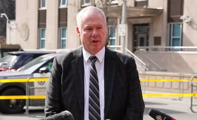 Chief Superintendent Chris Leather, officer in charge of criminal operations for the Royal Canadian Mounted Police, speaks outside the U.S. consulate during a news conference in Toronto, Tuesday March 10, 2026. (Frank Gunn/The Canadian Press via AP)