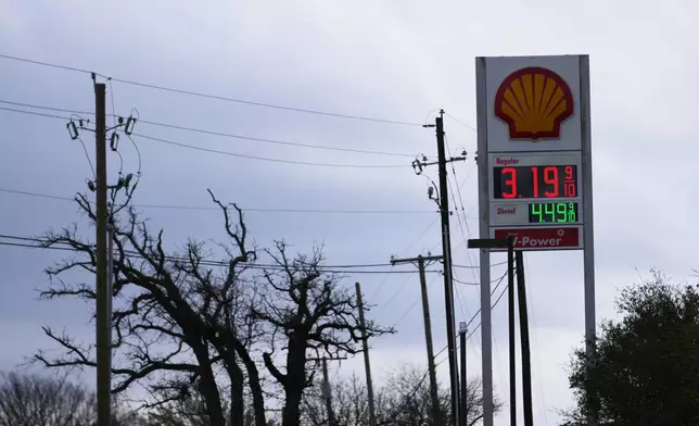 Gas prices are seen on a Shell station marqee Monday, March 9, 2026, in Arlington, Texas. (AP Photo/Julio Cortez)