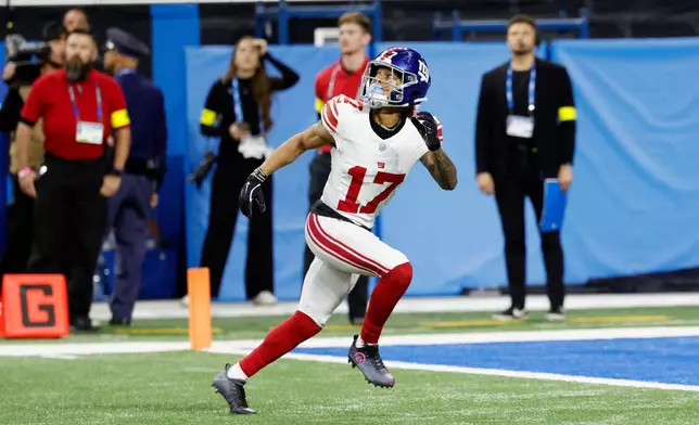 FILE - New York Giants wide receiver Wan'Dale Robinson runs a route against the Detroit Lions during an NFL football game in Detroit, Nov. 23, 2025. (AP Photo/Rick Osentoski, File)