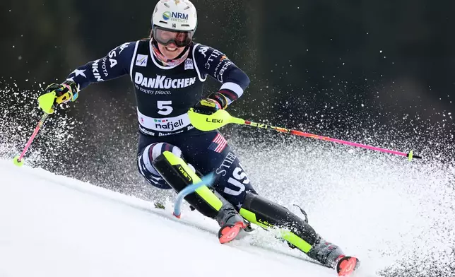 United States' Paula Moltzan competes in an alpine ski, women's slalom race, at the Lillehammer World Cup Finals, in Hafjell, Norway, Tuesday, March 24, 2026. (AP Photo/Marco Trovati)