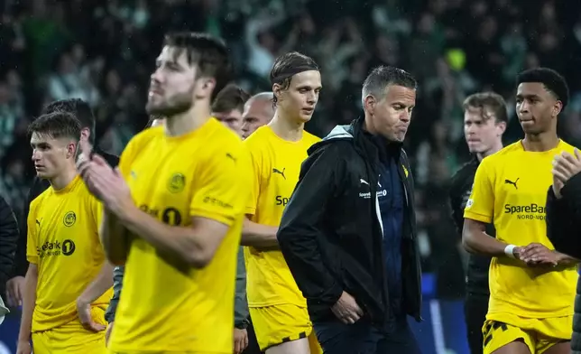 Bodo Glimt players are dejected at the end of a Champions League round of 16 second leg soccer match between Sporting CP and Bodo Glimt in Lisbon, Portugal, Tuesday, March 17, 2026. (AP Photo/Ana Brigida)