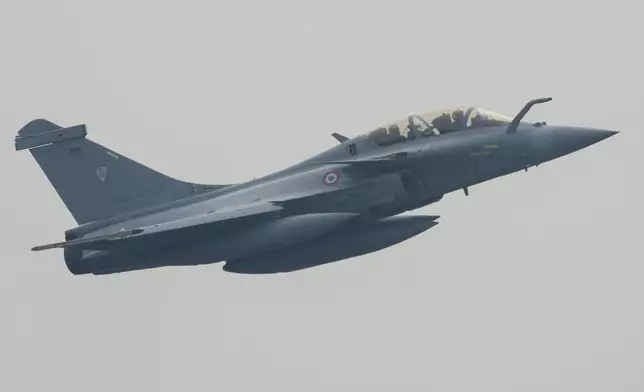 FILE - France's Rafale B twin-seat multirole fighter performs during the Pegase 2024 mission at Halim Perdanakusuma airport in Jakarta, Indonesia, Wednesday, July 24, 2024. (AP Photo/Tatan Syuflana, File)