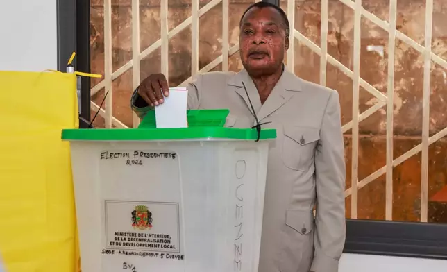 President of the Republic of Congo, Denis Sassou N'Guesso casts his ballot at a polling station in Brazzaville, the Republic of Congo, Sunday, March 15, 2026. (AP Photo/Vivace Mambouana)