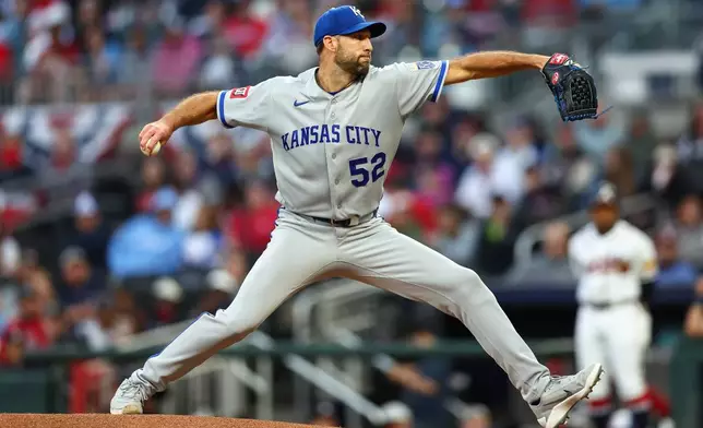 Kansas City Royals pitcher Michael Wacha (52) delivers in the first inning of a baseball game against the Atlanta Braves, Saturday, March 28, 2026, in Atlanta. (AP Photo/Colin Hubbard)