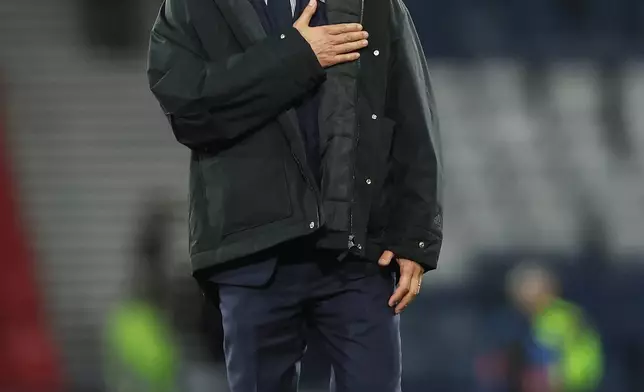 Japan head coach Hajime Moriyasu reacts after the international friendly soccer match between Scotland and Japan in Glasgow, Scotland, Saturday, March 28, 2026. (AP Photo/Scott Heppell)