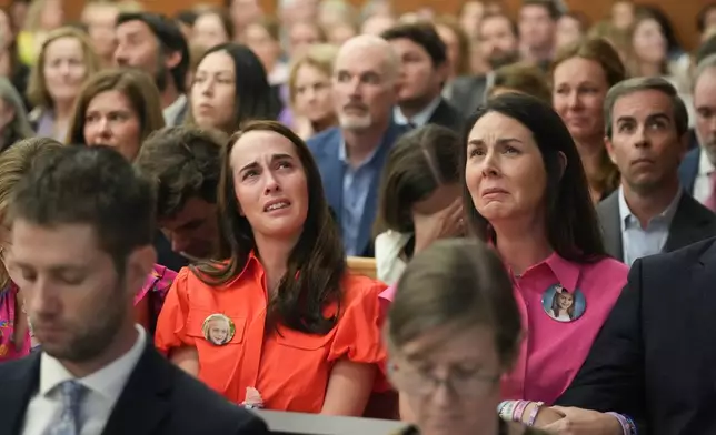 Alli Naylor, center left, mother of Wynne Naylor, and Malorie Lytal, center right, mother of Kellanne Lytal, attend a hearing about a temporary restraining order for Camp Mystic, at the Travis County Courthouse in Austin, Texas, on Wednesday, March 4, 2026. (Jay Janner/Austin American-Statesman via AP, Pool)