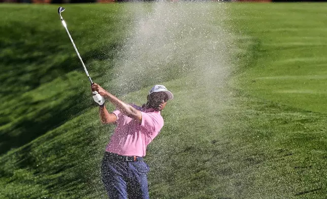 Sudarshan Yellamaraju of Canada hits from the sand along the second fairway during the third round of The Players Championship golf tournament Saturday, March 14, 2026, in Ponte Vedra Beach, Fla. (AP Photo/Gerald Herbert)