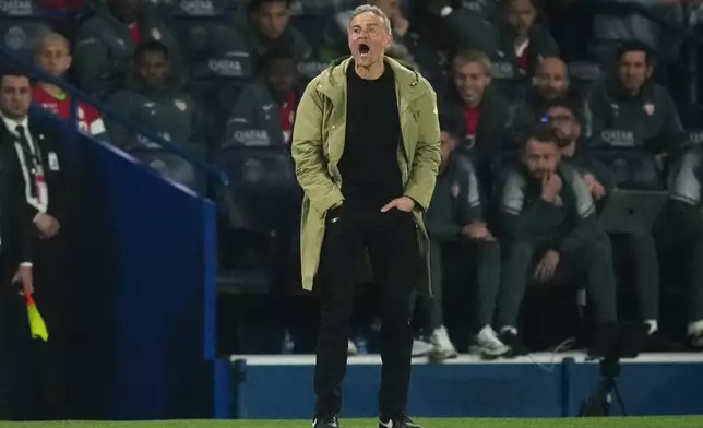 PSG's head coach Luis Enrique reacts during the French League One soccer match between Paris Saint-Germain and Monaco in Paris, Friday, March 6, 2026. (AP Photo/Thibault Camus)