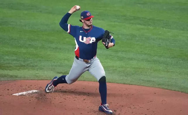 United States pitcher Paul Skenes (30) aims a pitch during the first inning of a World Baseball Classic semifinal game against the Dominican Republic, Sunday, March 15, 2026, in Miami. (AP Photo/Rebecca Blackwell)
