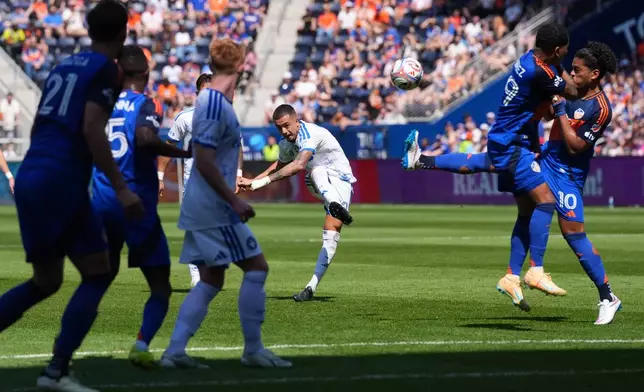 CF Montréal midfielder Iván Jaime, center, takes a free kick during the first half of an MLS soccer match against FC Cincinnati, Sunday, March 22, 2026, in Cincinnati. (AP Photo/Kareem Elgazzar)