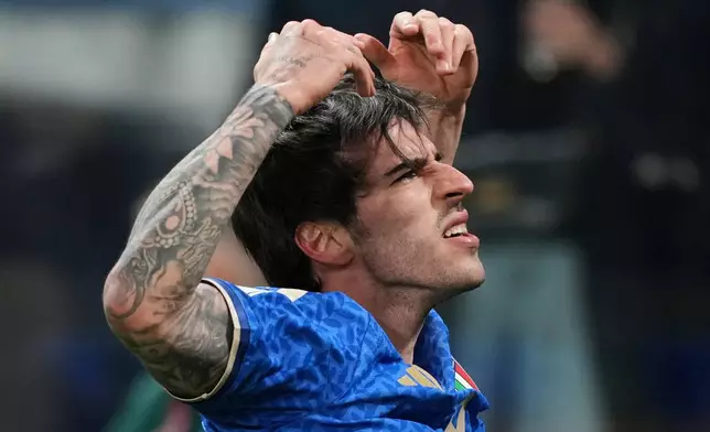 Italy's Sandro Tonali celebrates after scoring his side's first goal during the World Cup qualifying play-off soccer match between Italy and Northern Ireland, in Bergamo, Italy, Thursday, March 26, 2026. (AP Photo/Antonio Calanni)