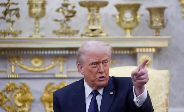 President Donald Trump speaks during a meeting with German Chancellor Friedrich Merz in the Oval Office at the White House, Tuesday, March 3, 2026, in Washington. (AP Photo/Mark Schiefelbein)