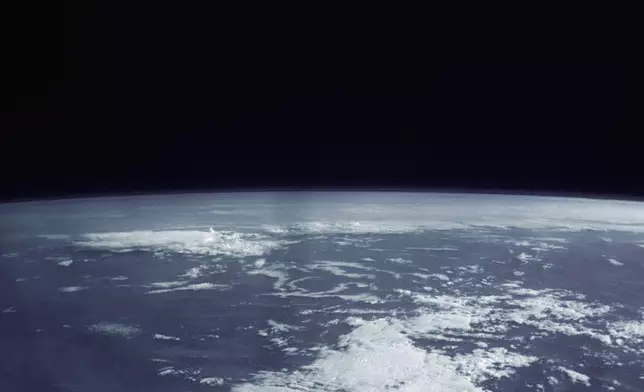 FILE - This photo provided by NASA shows the Atlantic Ocean as astronaut Leroy Gordon Cooper orbits the earth in spaceship Faith 7 on May 16, 1963. (AP Photo/NASA, File)