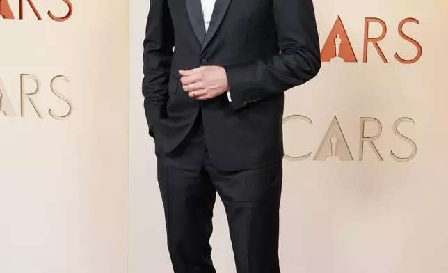 Joachim Trier arrives at the Oscars on Sunday, March 15, 2026, at the Dolby Theatre in Los Angeles. (Photo by Jordan Strauss/Invision/AP)