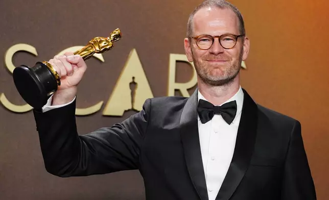 Joachim Trier, winner of the award for international feature film for "Sentimental Value," poses in the press room at the Oscars on Sunday, March 15, 2026, at the Dolby Theatre in Los Angeles. (Photo by Jordan Strauss/Invision/AP)