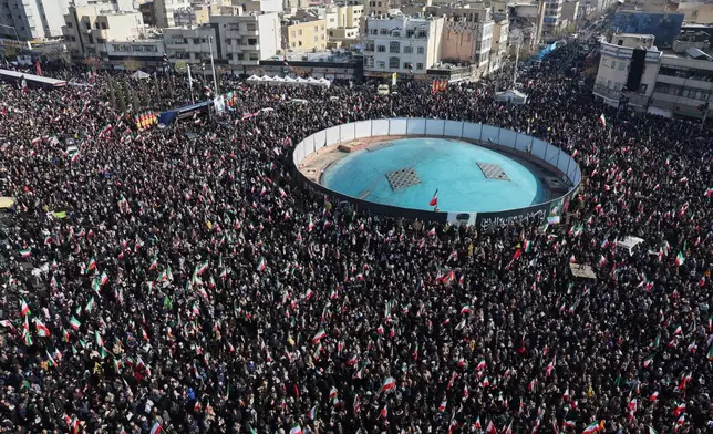 People gather in a rally to support Ayatollah Mojtaba Khamenei, the successor to his late father Ayatollah Ali Khamenei as supreme leader, in Tehran, Iran, Monday, March 9, 2026. (AP Photo/Vahid Salemi)