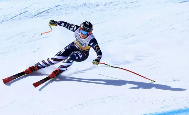 United States' Breezy Johnson speeds down the course during an alpine ski, women's World Cup downhill, in Val di Fassa, Italy, Saturday, March 7, 2026. (AP Photo/Luciano Bisi)