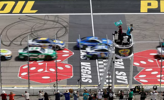 Drives get the green flag at the start of a NASCAR Cup Series auto race at Las Vegas Motor Speedway, Sunday, March 15, 2026, in Las Vegas. (AP Photo/Steve Marcus)