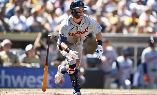 Detroit Tigers' Kevin McGonigle (7) hits a double during the third inning of an opening-day baseball game against the San Diego Padres Thursday, March 26, 2026, in San Diego. (AP Photo/Denis Poroy) CORRECTS SPELLING OF McGonigle from McGonigal.