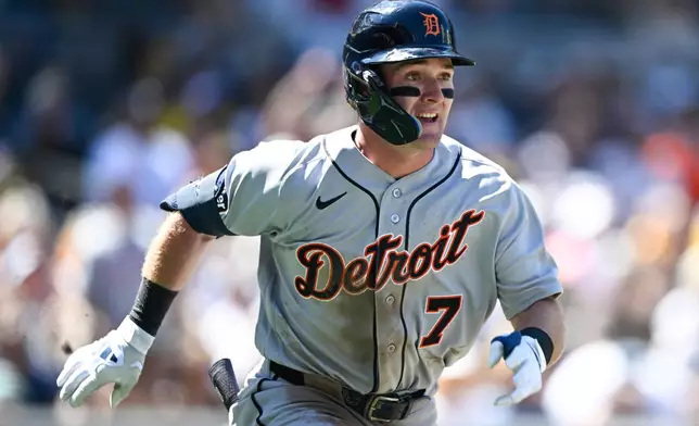 Detroit Tigers' Kevin McGonigle (7) hits a double during the third inning of an opening-day baseball game against the San Diego Padres Thursday, March 26, 2026, in San Diego. (AP Photo/Denis Poroy) CORRECTS SPELLING OF McGonigle from McGonigal.