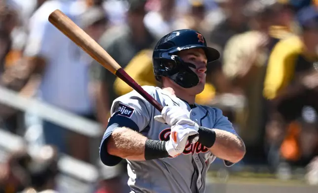 Detroit Tigers' Kevin McGonigle watches his RBI double during the first inning of an opening-day baseball game against the San Diego Padres, Thursday, March 26, 2026, in San Diego. (AP Photo/Denis Poroy) CORRECTS SPELLING OF McGonigle from McGonigal.
