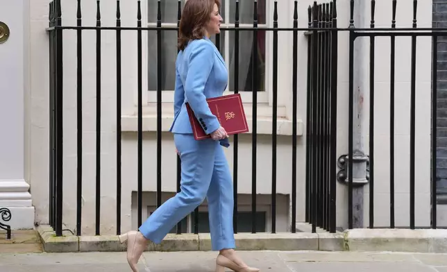 Britain's Chancellor of the Exchequer Rachel Reeves leaves 11 Downing Street to deliver the Spring Statement in London, Tuesday, March 3, 2026.(AP Photo/Kin Cheung)