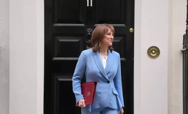 Britain's Chancellor of the Exchequer Rachel Reeves leaves 11 Downing Street to deliver the Spring Statement in London, Tuesday, March 3, 2026.(AP Photo/Kin Cheung)