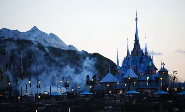 The new theme World of Frozen is pictured during its inauguration at Disneyland Paris in Marne-la-Vallee, east of Paris, Saturday, March 28, 2026. (AP Photo/Christophe Ena)