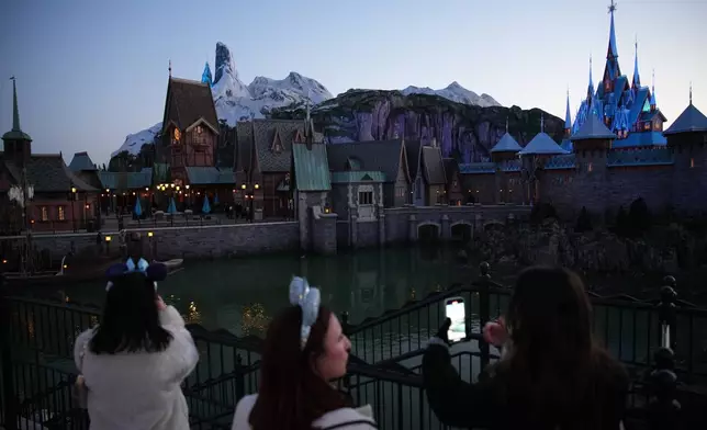 The new theme World of Frozen is pictured during its inauguration at Disneyland Paris in Marne-la-Vallee, east of Paris, Saturday, March 28, 2026. (AP Photo/Christophe Ena)