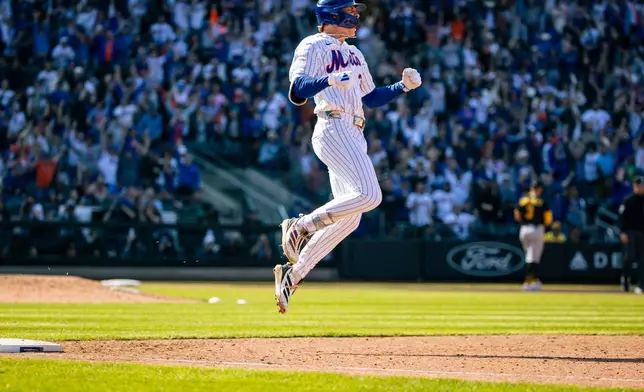 New York Mets' Carson Benge (3) celebrates after hitting a home run in the sixth inning of an opening-day baseball game against the Pittsburgh Pirates, Thursday, March 26, 2026, in New York. (AP Photo/Angelina Katsanis)